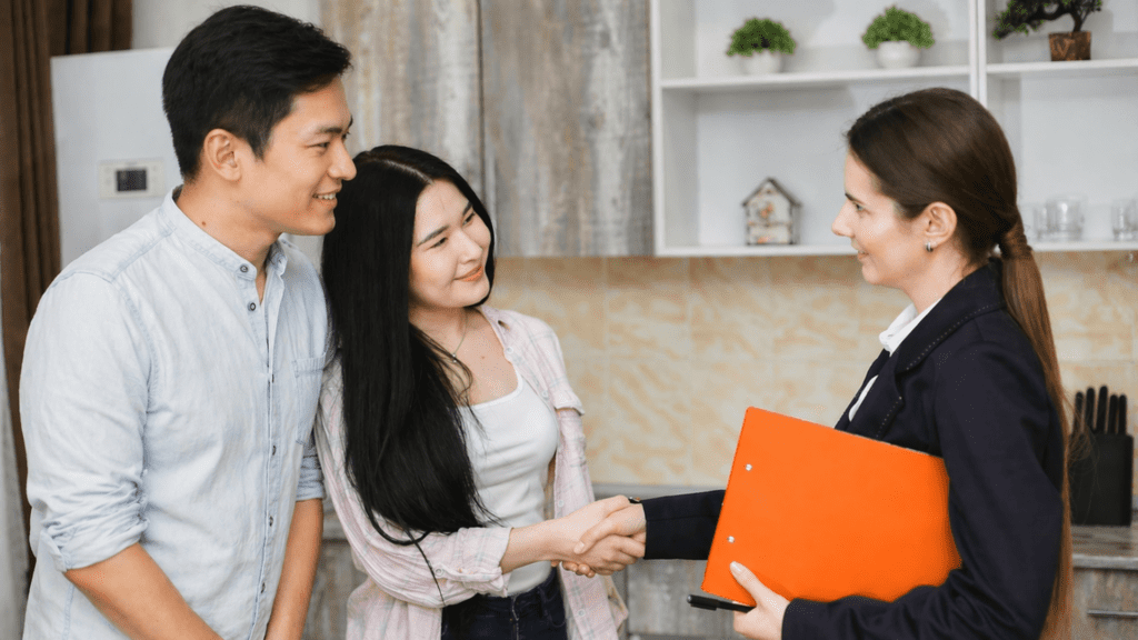 a couple with their apartment administrator