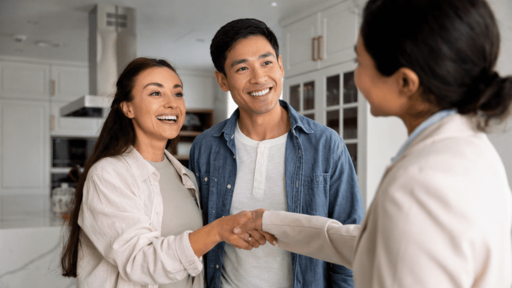 a couple closing the deal with an agent