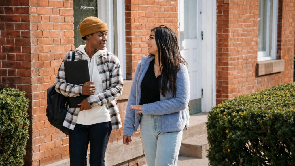 two friends talking while walking from school