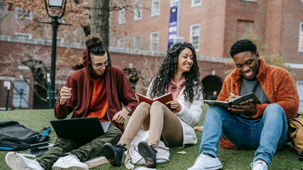 a group of friends studying on campus