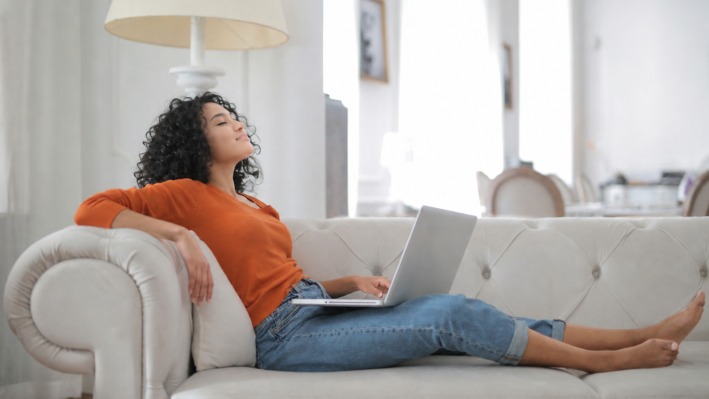 girl on her laptop in her apartment